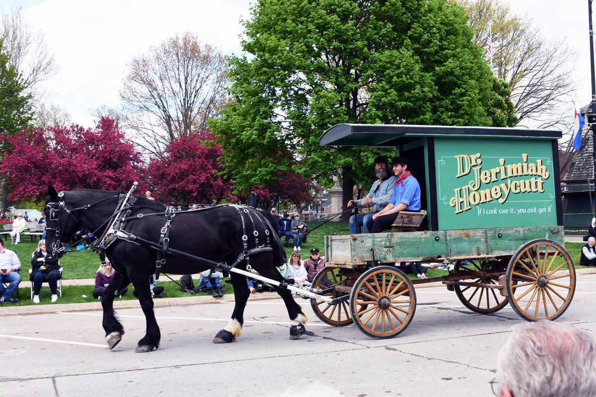 253 Many of the parade entries are horse-drawn vehicles showcasing the heritage.JPG